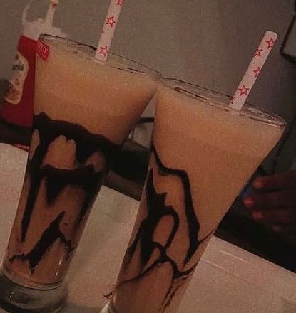 Two shakes with chocolate drizzle